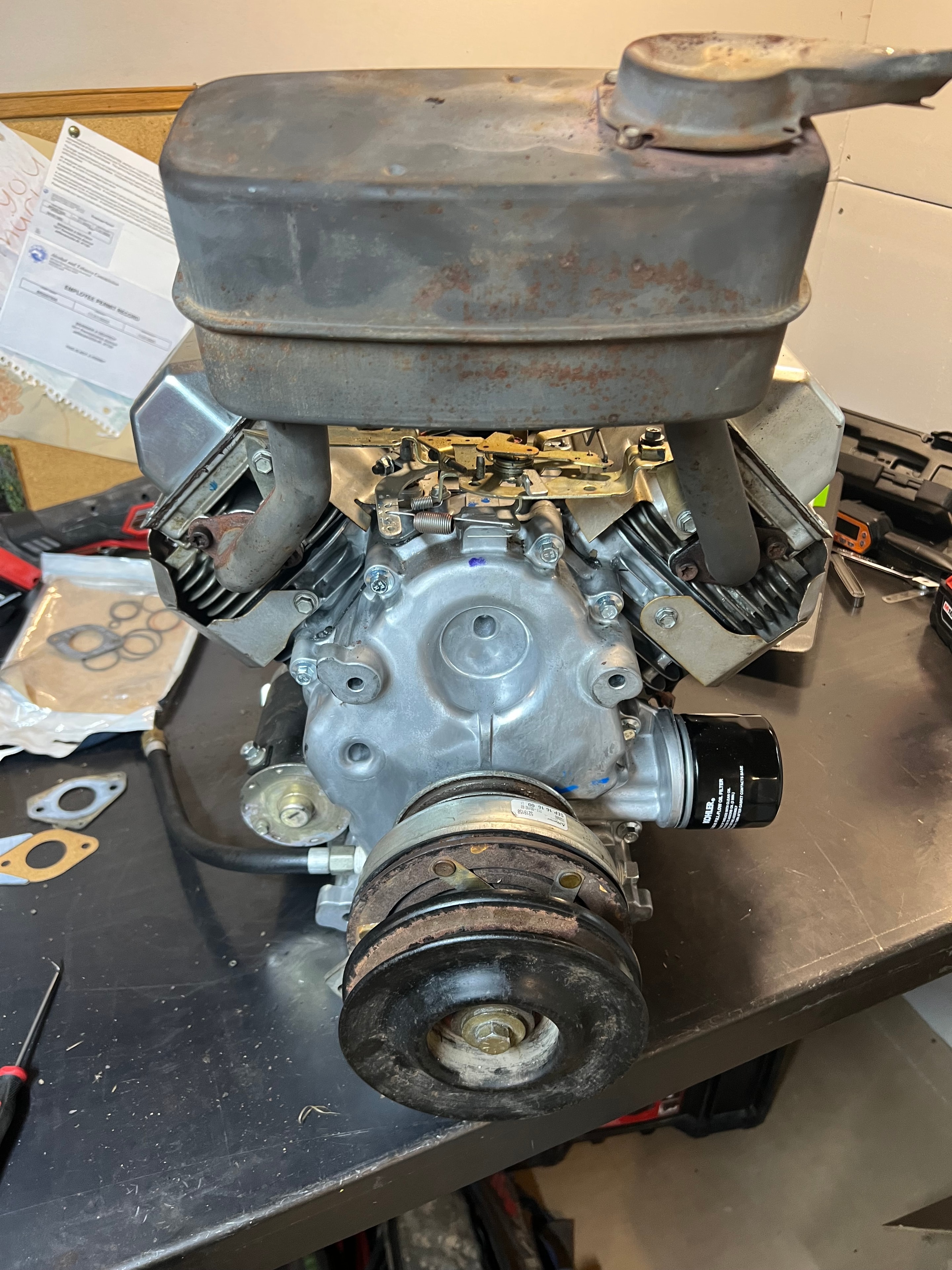 Kohler engine components during reassembly