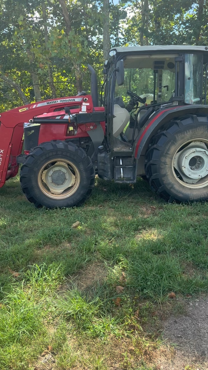 Red Massey Ferguson tractor in the field
